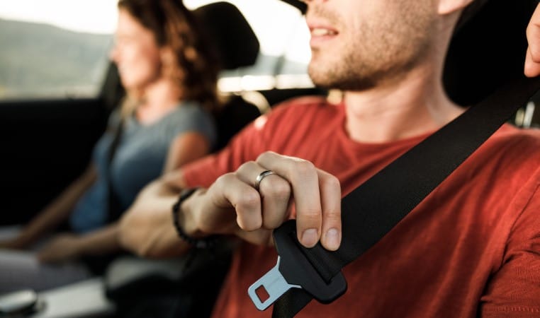 fastening seatbelt in a car